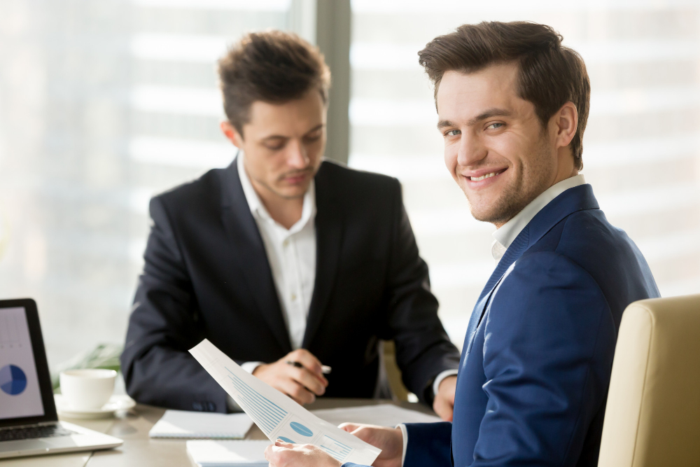 smiling-businessman-financial-analyst-or-stock-broker-looking.jpg